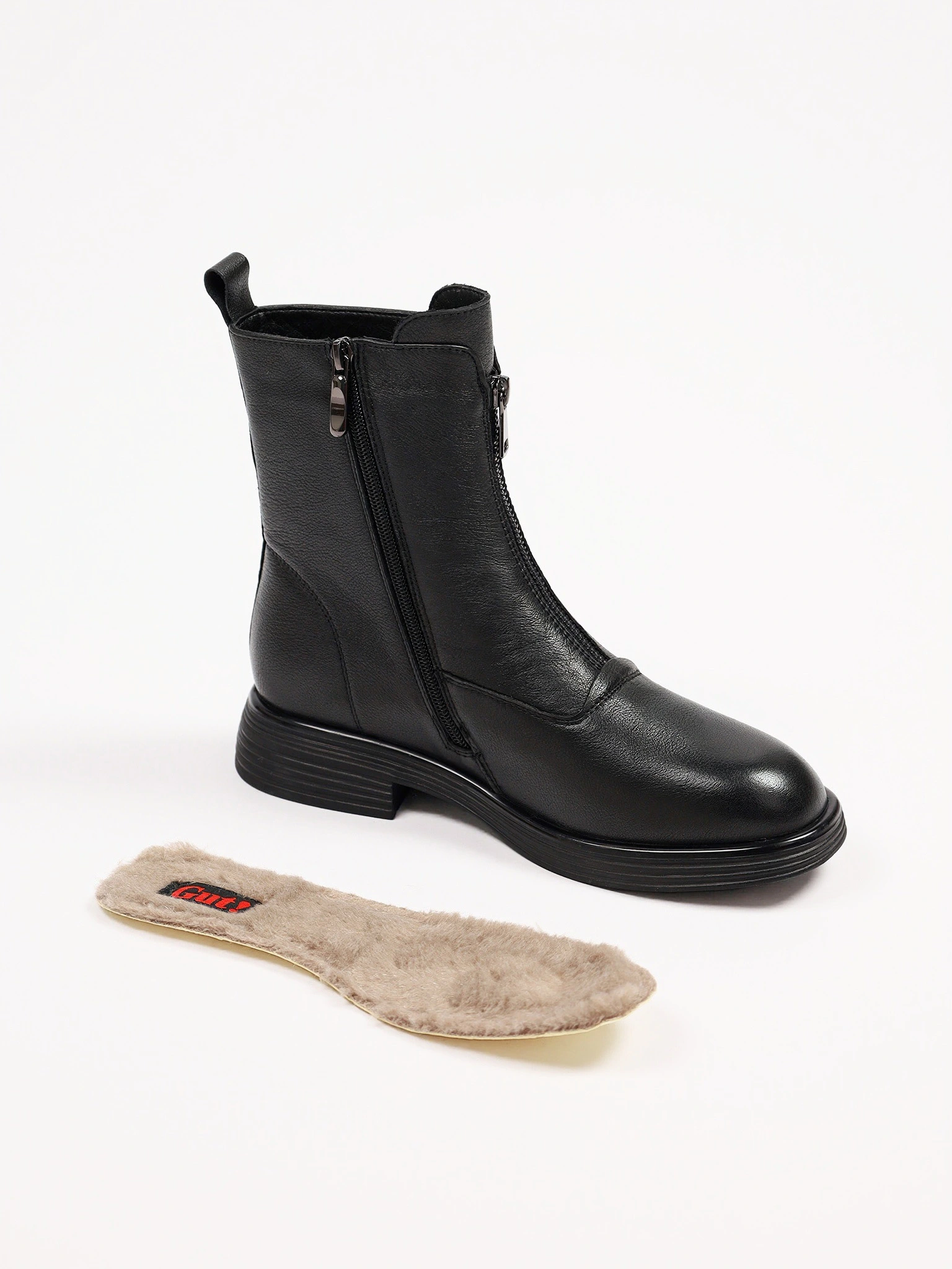 Ботинки черного цвета с декоративной молнией спереди